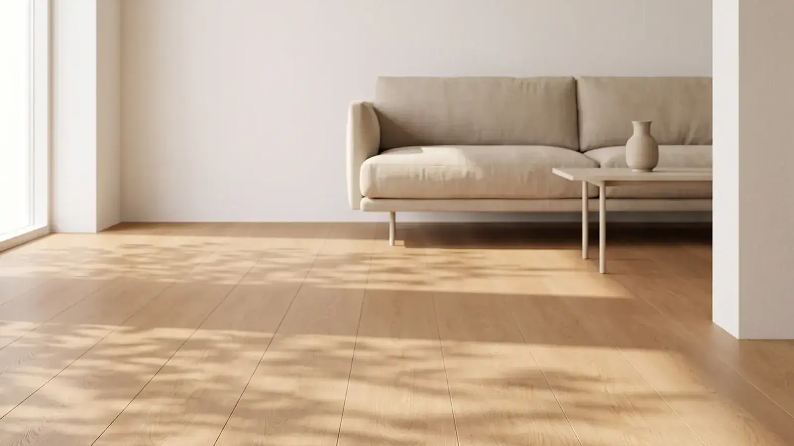 Warm oak plank floor in a bright condo living room with a linen sofa and soft window shadows