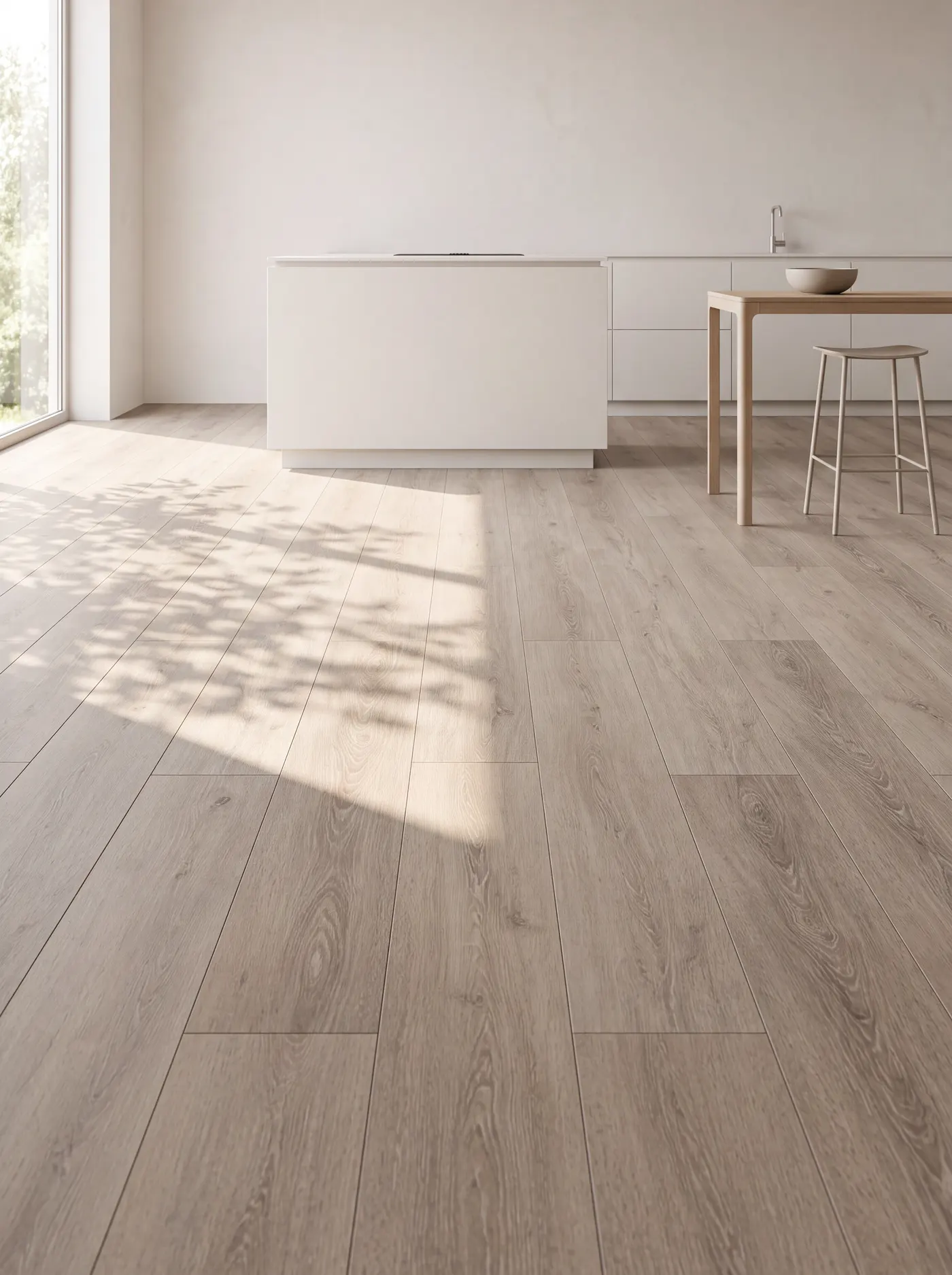 Limewashed oak flooring installed wall to wall in a bright kitchen